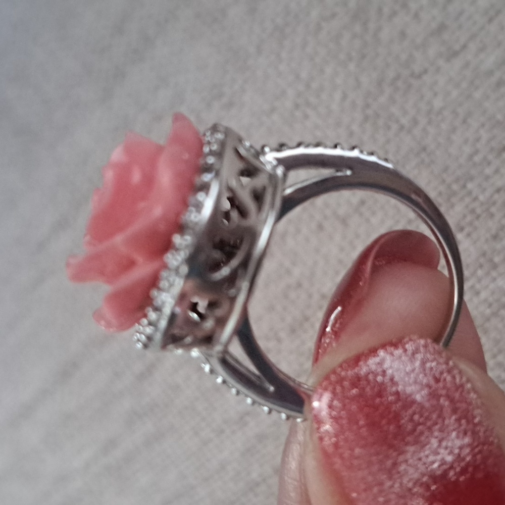 Sterling Silver Pink Coral Flower Ring with Cubic Zirconia and Heart design.